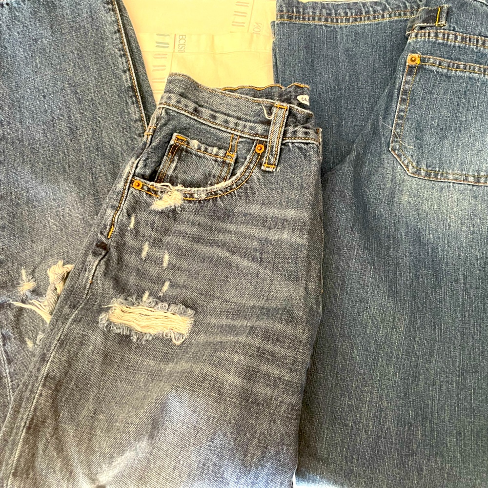 Two pairs of blue jeans for young girls